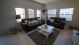 Living room with 2 comfortable leather sofas from Tall Palms 2 Townhouse for rent in Orlando