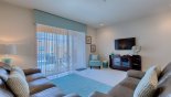 Spacious rental Serenity / Retreat Silver Creek Townhouse in Orlando complete with stunning Living room with views & direct access onto pool deck