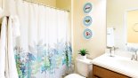 Bedroom #3 ensuite bathroom with bath & shower over - www.iwantavilla.com is the best in Orlando vacation Villa rentals