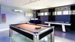 Games room with pool table, air hockey & bar - www.iwantavilla.com is your first choice of Villa rentals in Orlando direct with owner