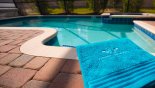 Privacy screened pool with branded beach towels - www.iwantavilla.com is your first choice of Villa rentals in Orlando direct with owner