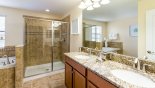 Cayman 1 Villa rental near Disney with Master #1 ensuite bathroom with Roman bath, walk-in shower, dual vanities & separate WC