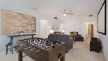 Entertainment loft with table foosball game with this Orlando Villa for rent direct from owner