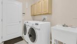 Laundry room with washer, dryer, iron & ironing board from Highlands Reserve rental Villa direct from owner