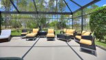 Soft seating area on pool deck from Highlands Reserve rental Villa direct from owner