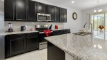 Fully fitted kitchen with quality appliances and granite counter tops with this Orlando Villa for rent direct from owner