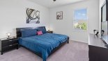 Villa rentals in Orlando, check out the Master bedroom #2 with king sized bed & smart TV