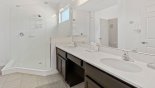 Villa rentals in Orlando, check out the Master #1 ensuite bathroom with large walk-in shower. his & hers sinks & separate WC