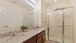 Master #2 ensuite bathroom with walk-in shower. his & hers sinks & separate WC from Atlantic 1 Villa for rent in Orlando