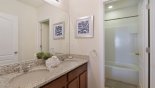 Villa rentals near Disney direct with owner, check out the Family bathroom #4 with separate bath and shower over, dual sinks & WC