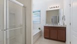 Atlantic 1 Villa rental near Disney with Master #1 ensuite bathroom with Roman bath, walk-in shower, single vanity & separate WC