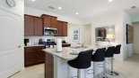Breakfast bar with 4 bar stools with this Orlando Villa for rent direct from owner