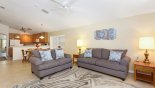 Family room adjacent to dining area with this Orlando Villa for rent direct from owner