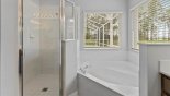Master ensuite bathroom with bath, walk-in shower, his 'n' hers sinks & separate WC from Highlands Reserve rental Villa direct from owner