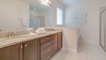 Villa rentals near Disney direct with owner, check out the Master #1 ensuite bathroom with bath, walk-in shower, dual sinks & separate WC