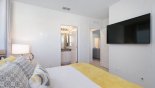 Spacious rental Solterra Resort Villa in Orlando complete with stunning Master bedroom #3 with large wall mounted LCD TV