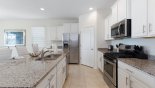 Villa rentals in Orlando, check out the Fully fitted kitchen with quality appliances and granite counter tops
