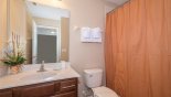 Ensuite bathroom #3 with bath & shower over with this Orlando Villa for rent direct from owner