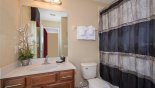Ensuite bathroom #4 with bath & shower over from Magna Bay 2 Villa for rent in Orlando