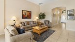 Family room with comfortable seating for all with this Orlando Villa for rent direct from owner