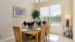 Dining area with pleasant views onto pool deck from Jasmine 1 Villa for rent in Orlando