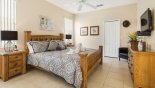 Villa rentals in Orlando, check out the Master 1 bedroom with tiled floors, quality hand made oak king sized bed & nightstands