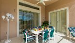 Villa rentals in Orlando, check out the Covered lanai with patio table & 6 chairs