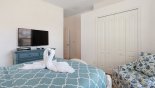 Villa rentals near Disney direct with owner, check out the Master bedroom #2 with wall mounted LCD cable TV