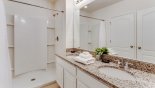 Master ensuite bathroom with large walk-in shower - www.iwantavilla.com is the best in Orlando vacation Villa rentals