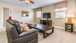 Spacious rental Champions Gate Villa in Orlando complete with stunning Entertainment loft with large wall mounted LCD cable TV