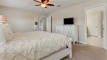 Master Bedroom #1 with LCD cable TV with this Orlando Villa for rent direct from owner