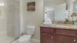Ensuite bathroom off bedroom #6 with walk-in shower from Champions Gate rental Villa direct from owner