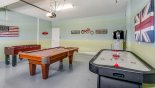 Spacious rental Champions Gate Villa in Orlando complete with stunning Games room with pool table, air hockey & table foosball