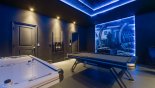 Awesome Avatar themed games room with pool table, air hockey, table foosball & dual LED screens with PS4 and AC - www.iwantavilla.com is your first choice of Villa rentals in Orlando direct with owner