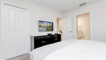 Villa rentals in Orlando, check out the Bedroom #4 with wall mounted LED cable TV