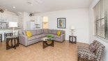 Stylish family room through to kitchen - www.iwantavilla.com is the best in Orlando vacation Villa rentals