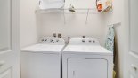 Villa rentals near Disney direct with owner, check out the Laundry facility at top of stairs with full-size washer & dryer