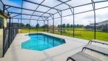 View of beautiful south-west facing pool and scenic pond views from Rimini 1 Villa for rent in Orlando