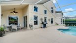 Spacious rental Highlands Reserve Villa in Orlando complete with stunning View from the deck to the covered lanai perfect for alfresco dining - note gas BBQ
