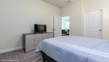 Villa rentals in Orlando, check out the Master bedroom #2 with LCD cable TV - open door leads to family room