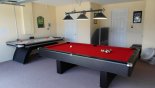 Games room with pool table, air hockey, electronic darts & large TV with PS2 - www.iwantavilla.com is your first choice of Villa rentals in Orlando direct with owner