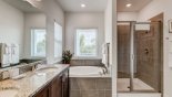 Villa rentals near Disney direct with owner, check out the Master #1 ensuite bathroom with Roman bath, walk-in shower, dual vanities & separate WC