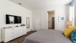 Spacious rental Reunion Resort Villa in Orlando complete with stunning Master bedroom #2 with wall mounted LCD cable TV