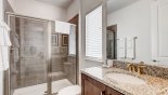 Ensuite bathroom #4 with walk-in shower, single sink & WC - www.iwantavilla.com is the best in Orlando vacation Villa rentals