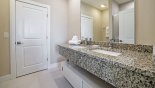 Spacious rental Magic Village Resort Townhouse in Orlando complete with stunning Master #1 ensuite bathroom with walk-in shower, his & hers sinks & WC - door leads to walk-in closet