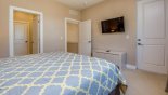 Master bedroom #2 with wall mounted LCD cable TV with this Orlando Townhouse for rent direct from owner