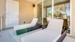 Townhouse rentals in Orlando, check out the Private balcony off master bedroom #2 with 2 quality sun loungers