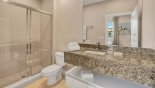 Ensuite bathroom #4 with walk-in shower, single sink & WC from Delight 4 Townhouse for rent in Orlando