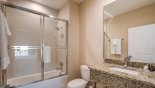 Ensuite bathroom #3 with bath & shower over, single vanity & WC from Magic Village Resort rental Townhouse direct from owner