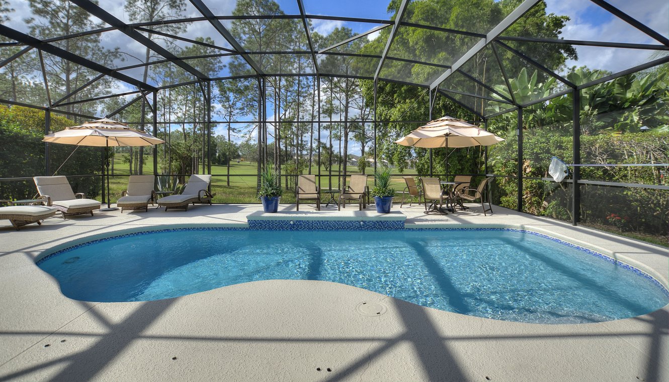 Private South West facing pool deck with golf course views